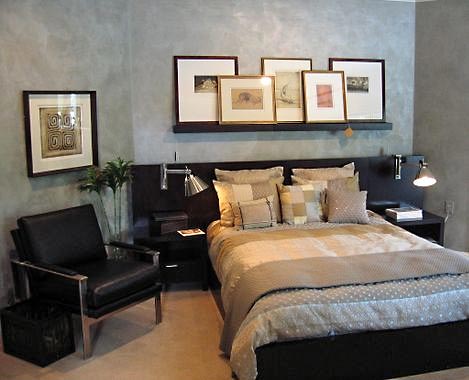 Faux painted finishes in a bedroom to give the look of old world plastered walls.